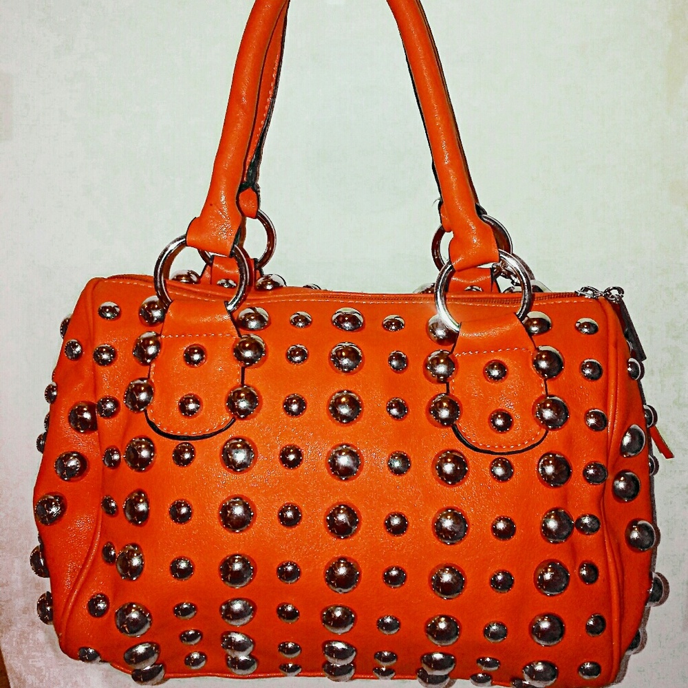 Orange silver studded handbag